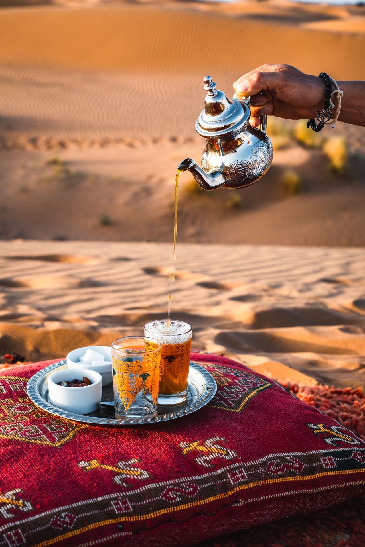 imgi_66_large-man-pouring-tea-1410112641.jpeg