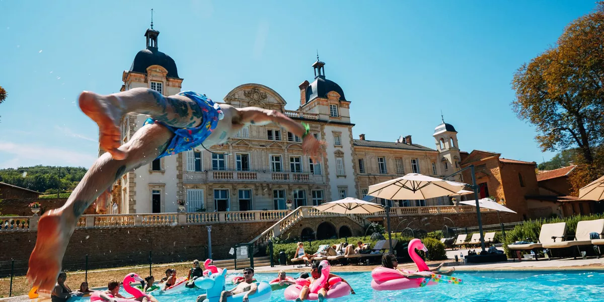 Young People Having Fun In A Swimming Pool Sunny Day