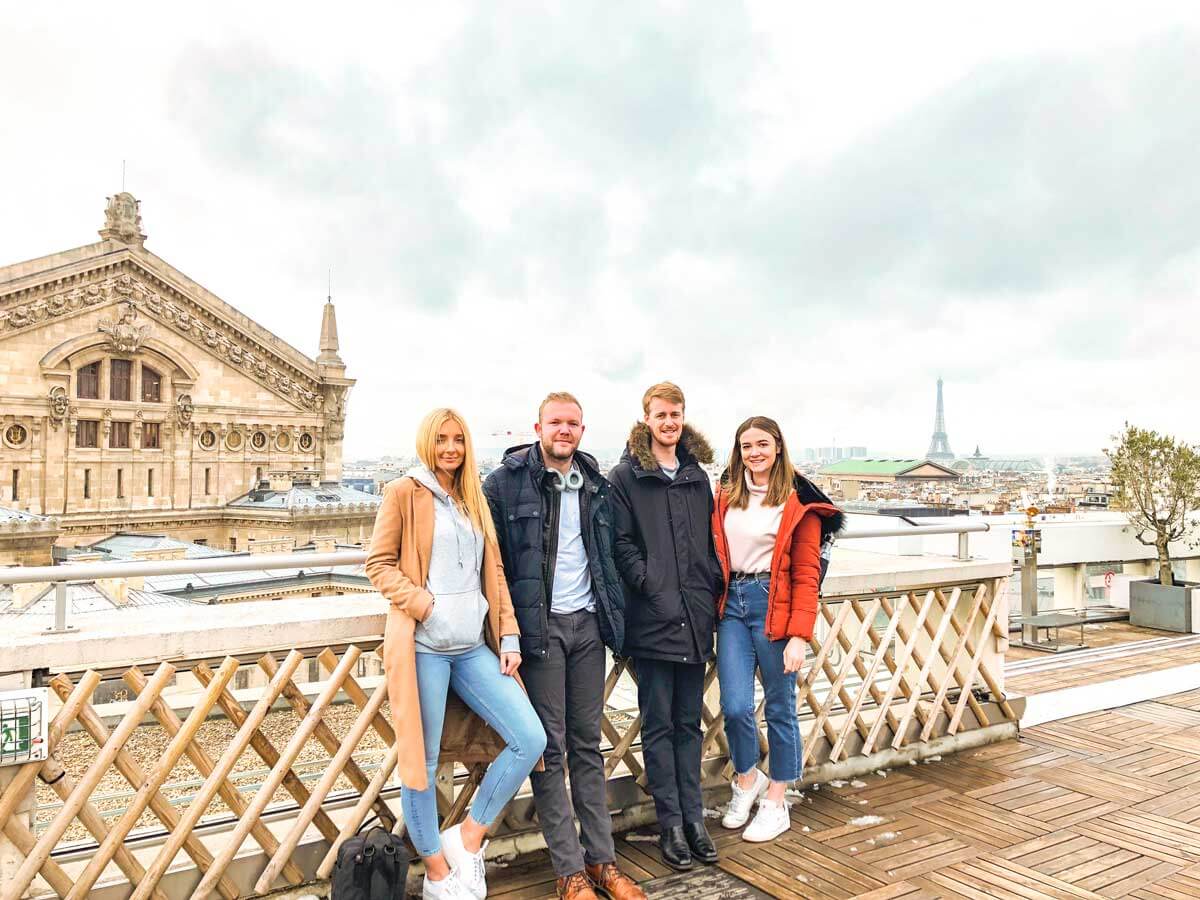 group infront of the effiel tower