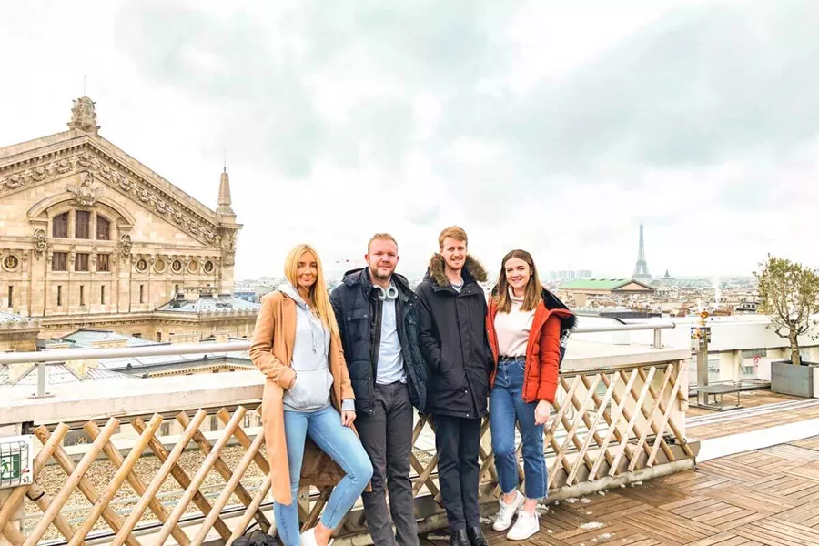 group infront of the effiel tower