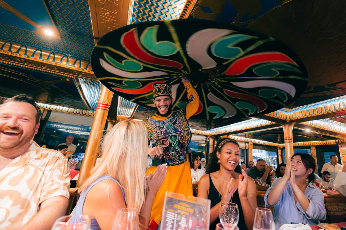 People Enjoying A Meal Man Wearing Traditional Clothes
