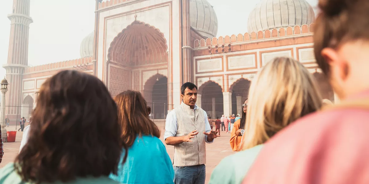 Local Guide Talking Outside Mosque