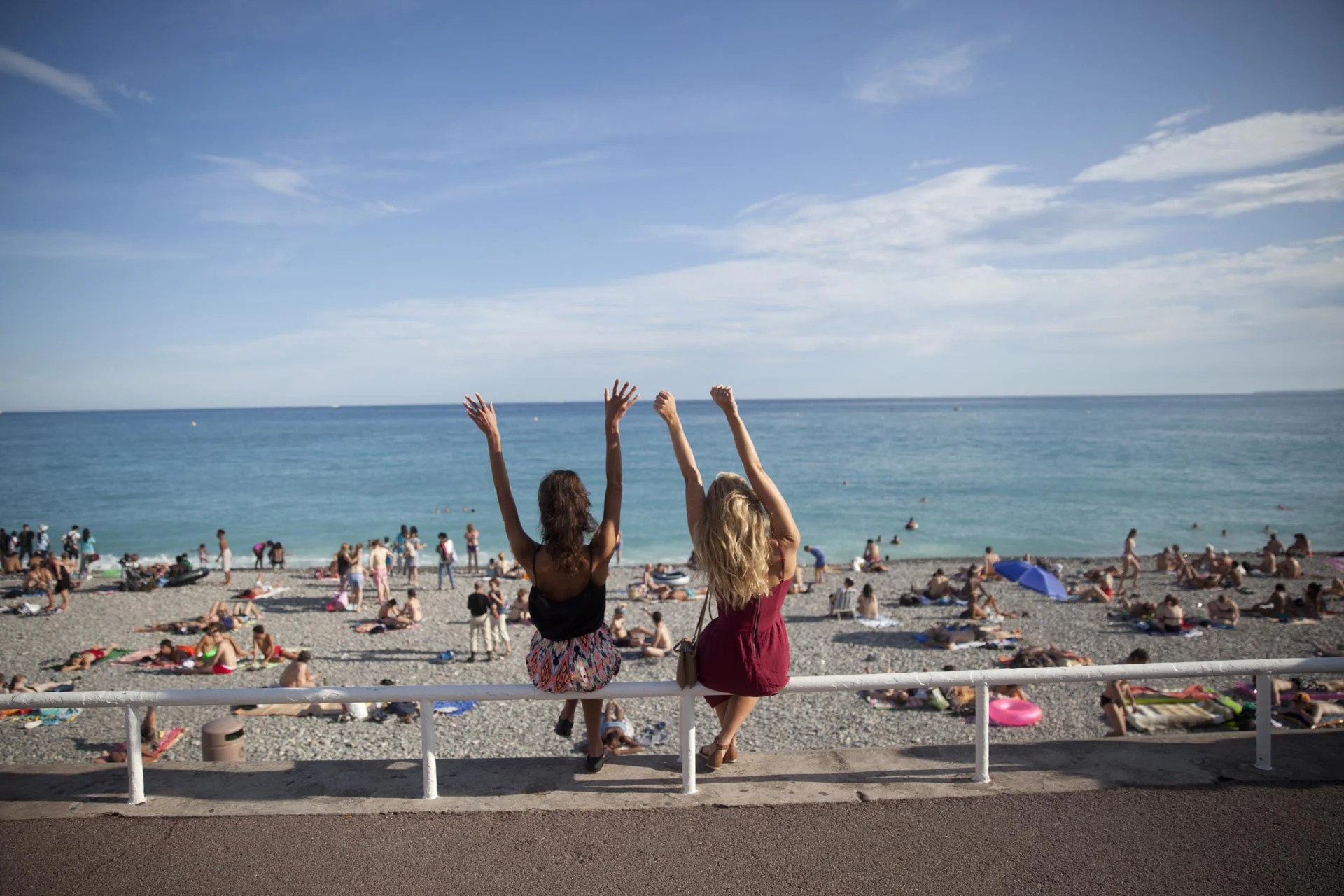 Travellers in Nice at the beach