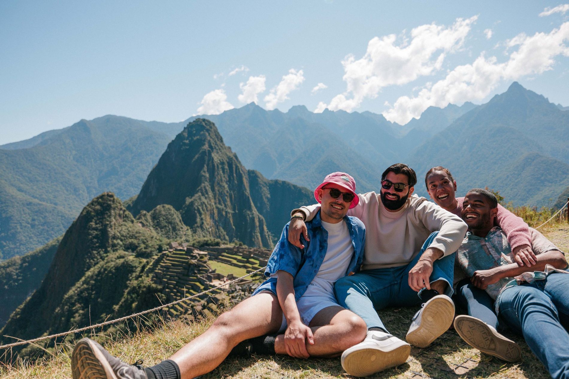 Four Friends Smiling Nature Landscape Mountains At The Background