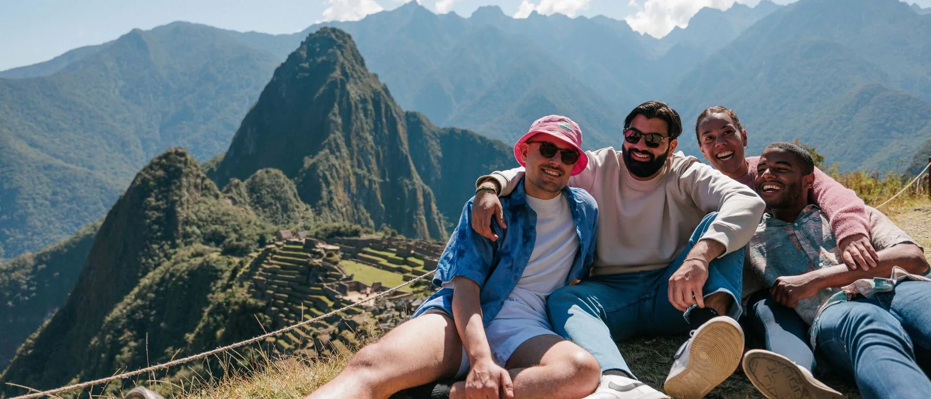 Four Friends Smiling Nature Landscape Mountains At The Background