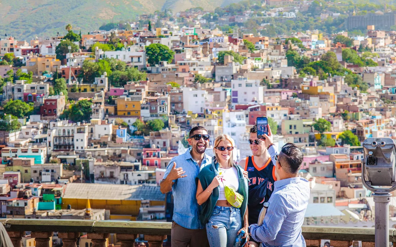 Group Of Young Travelers Taking Photo In Mexico
