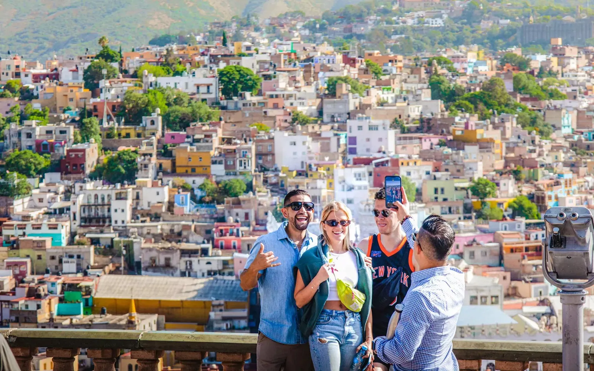 Group Of Young Travelers Taking Photo In Mexico