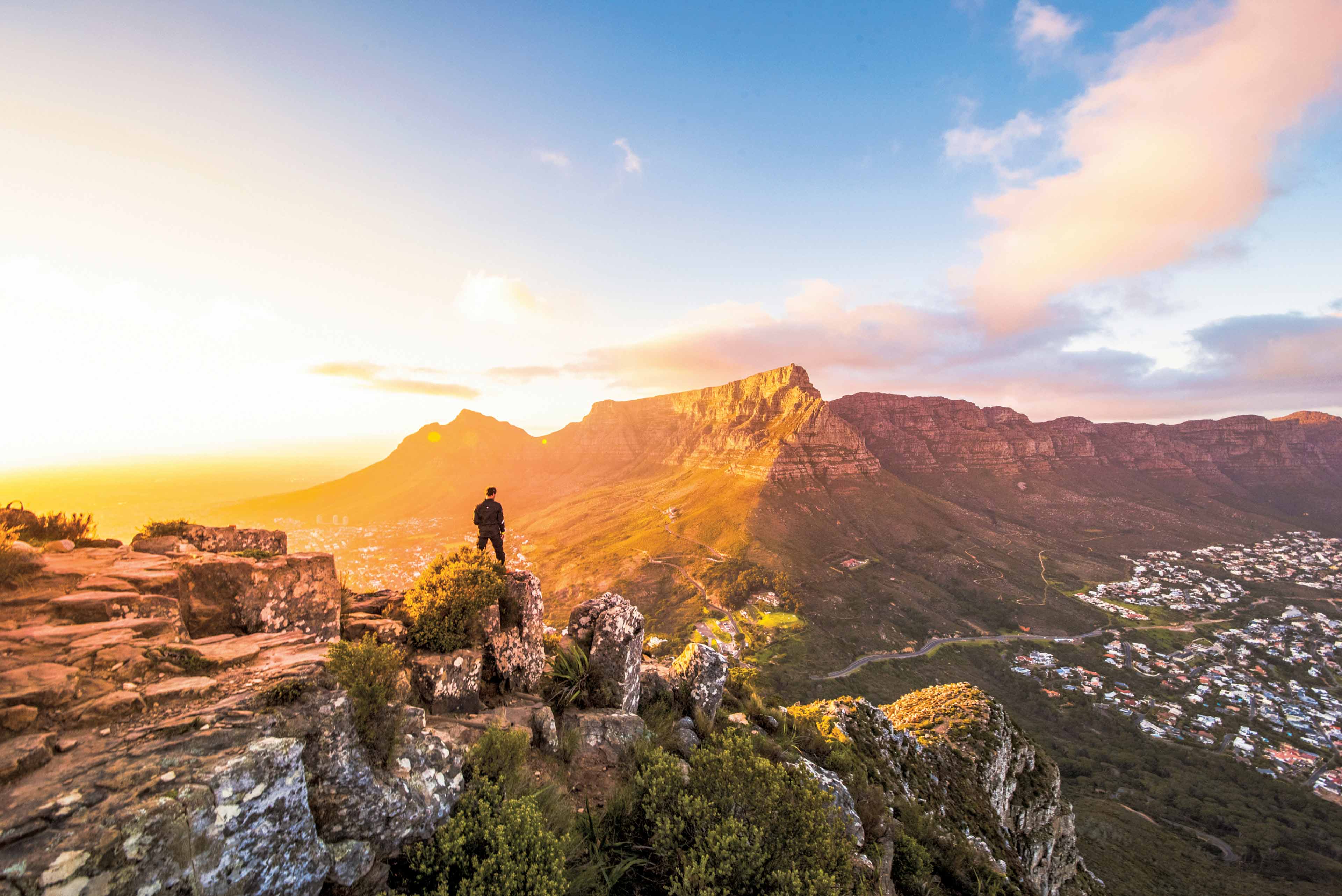 Man Looking At Sunset Over Table Mountain Cape Town South Africa