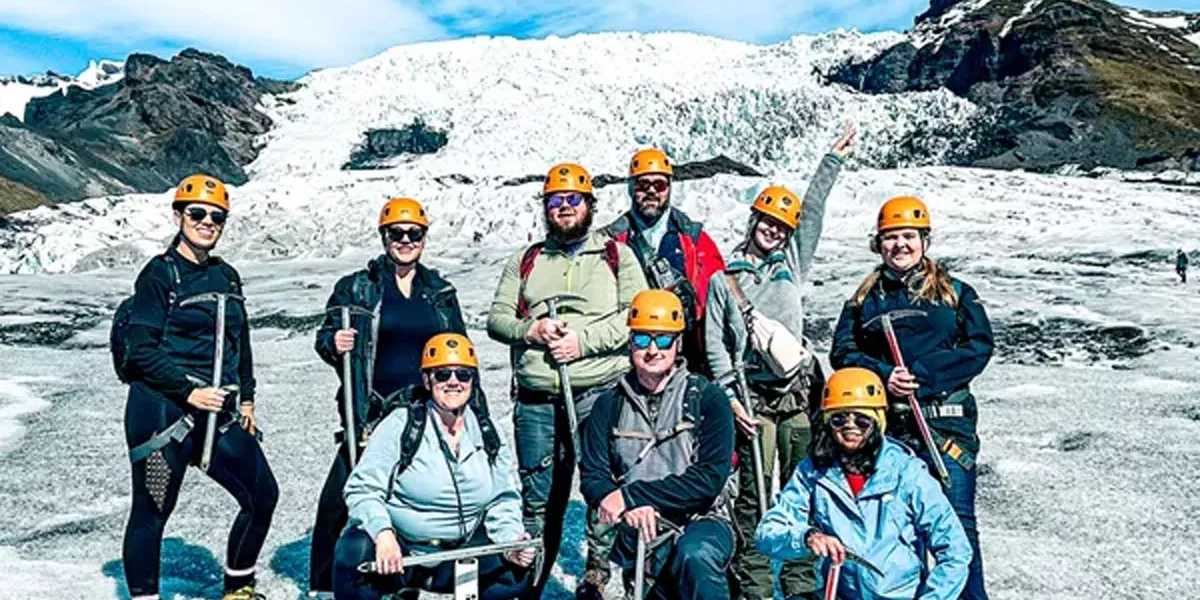 Group Of Friends Hiking Glaciar