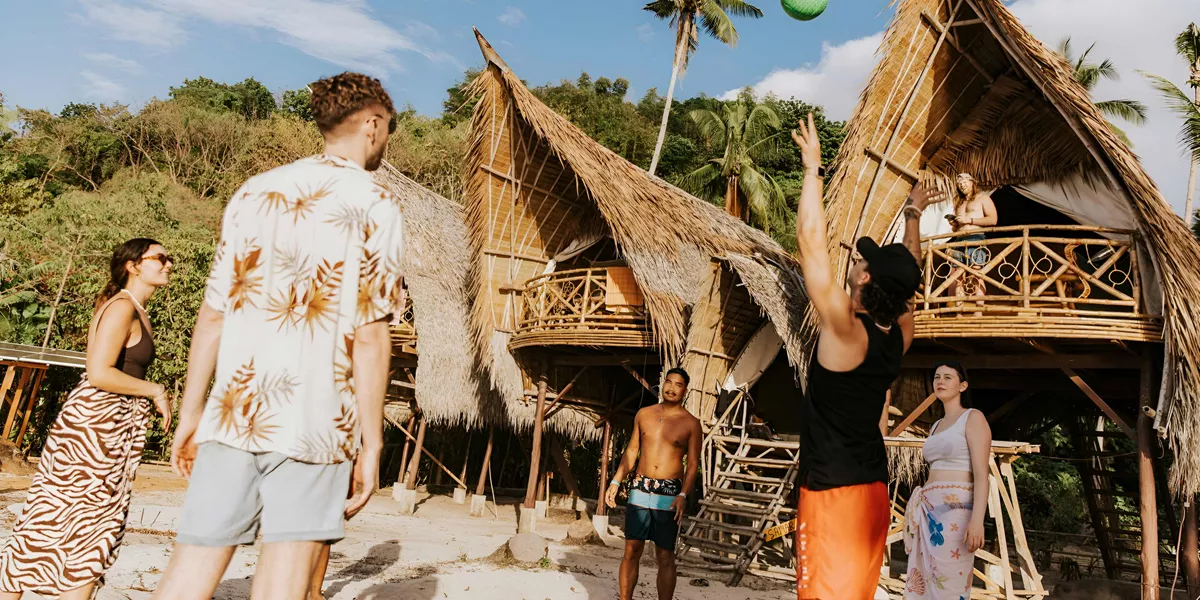 People Playing Ball Game On Beach Sunny Day Philippines