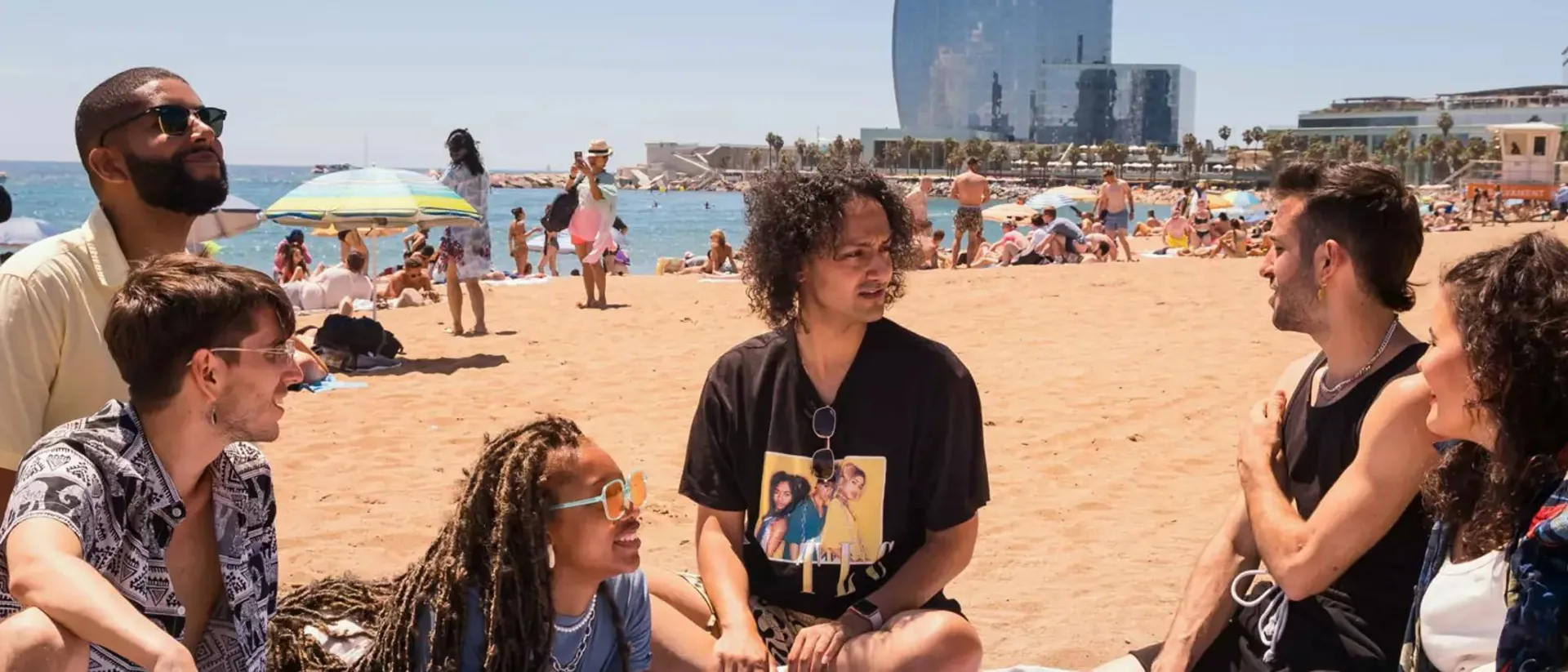Travellers enjoying the sun in Barcelona, Spain
