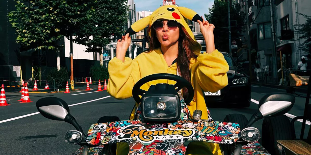 Girl Dressed As Pikachu On Quad Bike