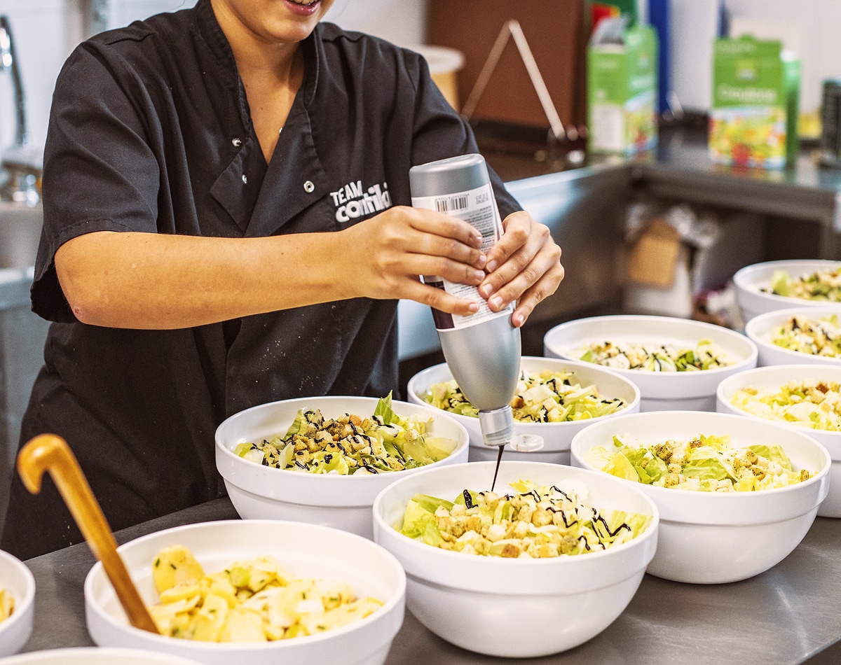 Chef Preparing Salads In Chateau Kitchen