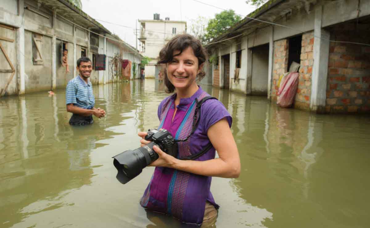 Wildlife Photographer In Street River