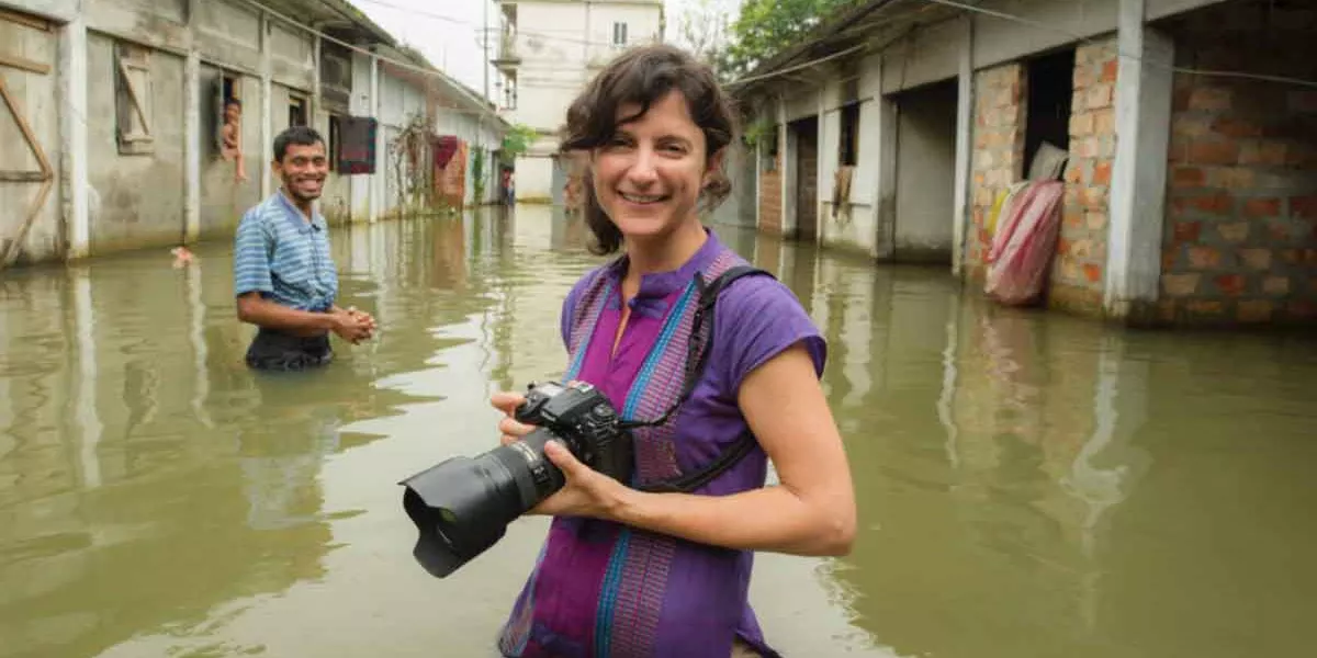 Wildlife Photographer In Street River