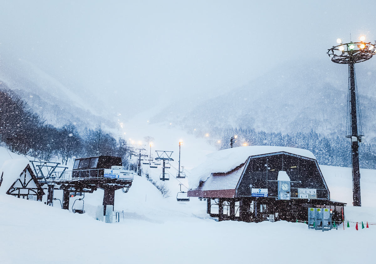 Landscape Of Mountains With Ski Lift Snowing