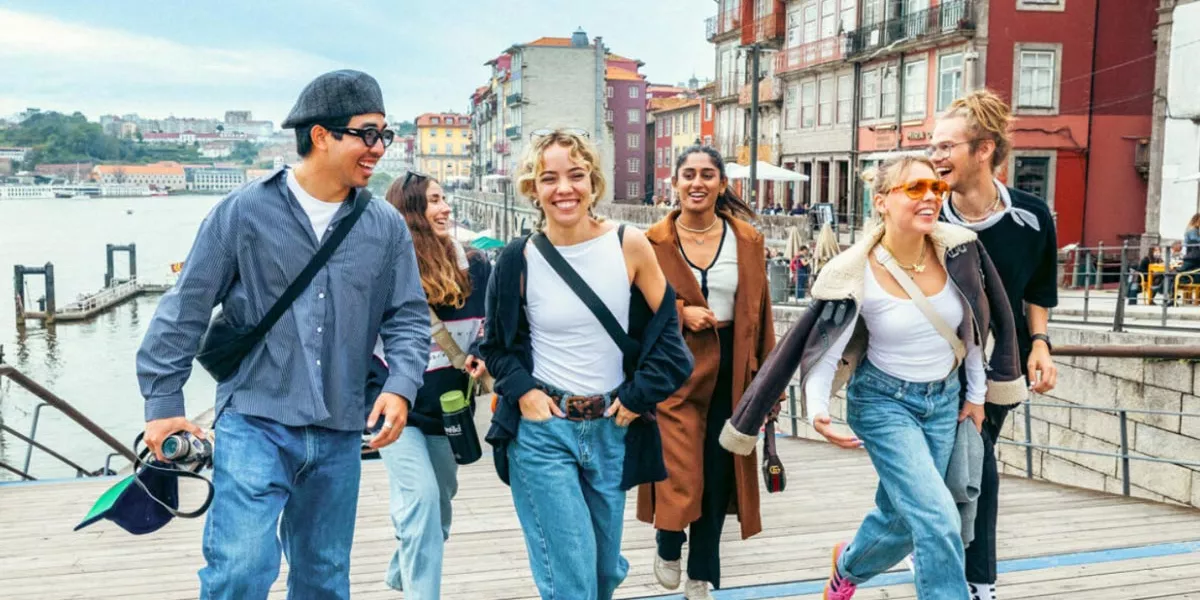 Young Friends Walking And Smiling