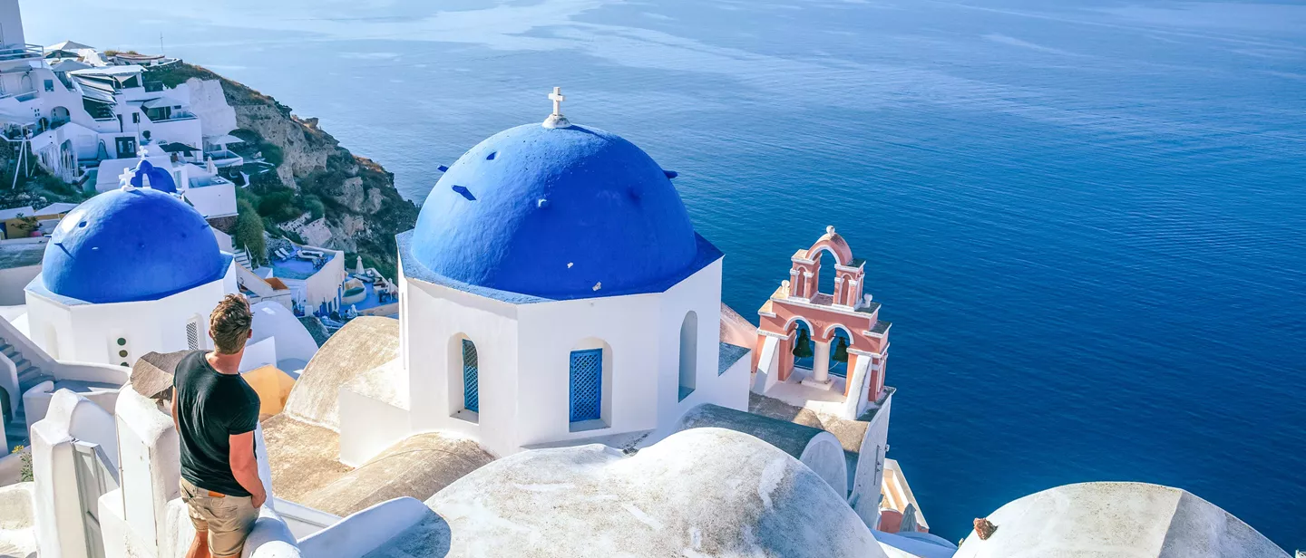 Guy Looking Out To Sea In Greece
