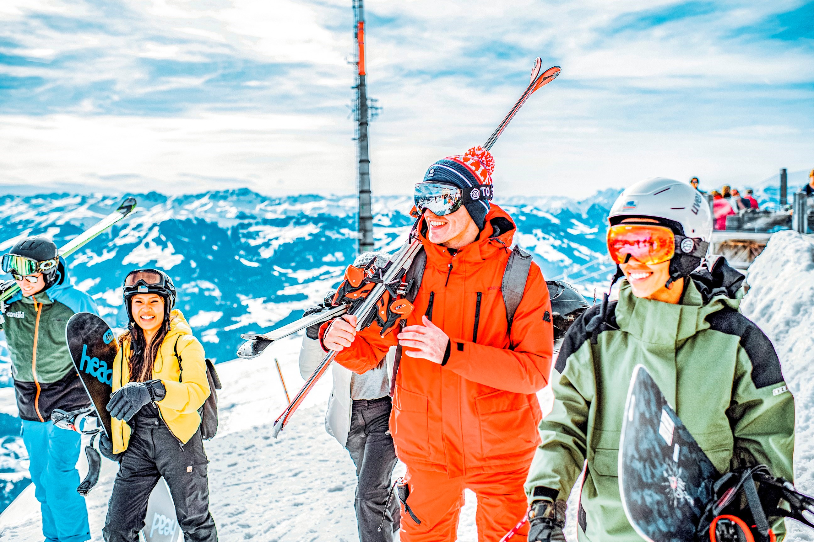 Travellers and instructor during a guided ski tour of the mountain in Hopfgarten, Austria. 