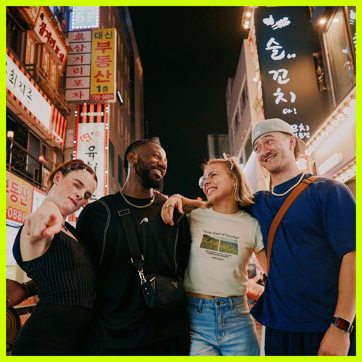 Influencer Nathan with group of people in the city at night