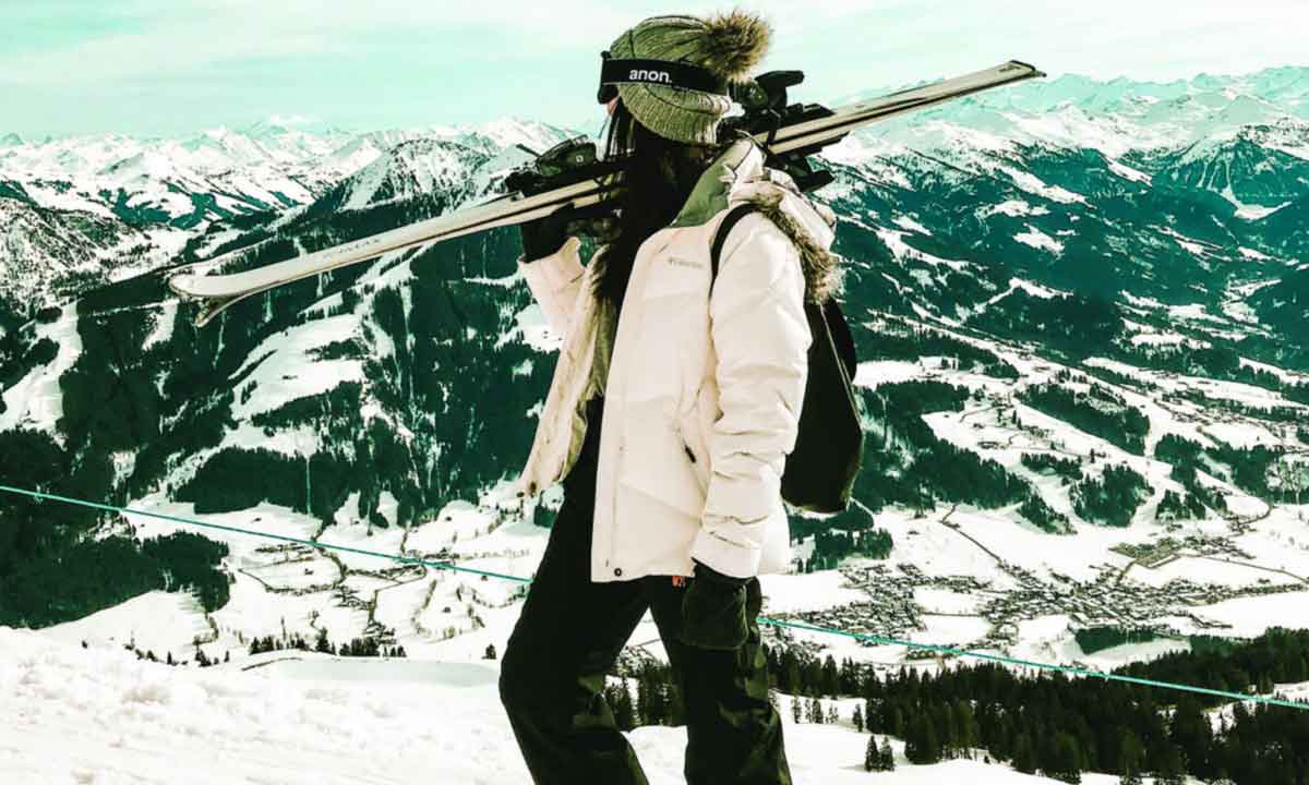 Young Female Skier In Snowy Mountains Austria