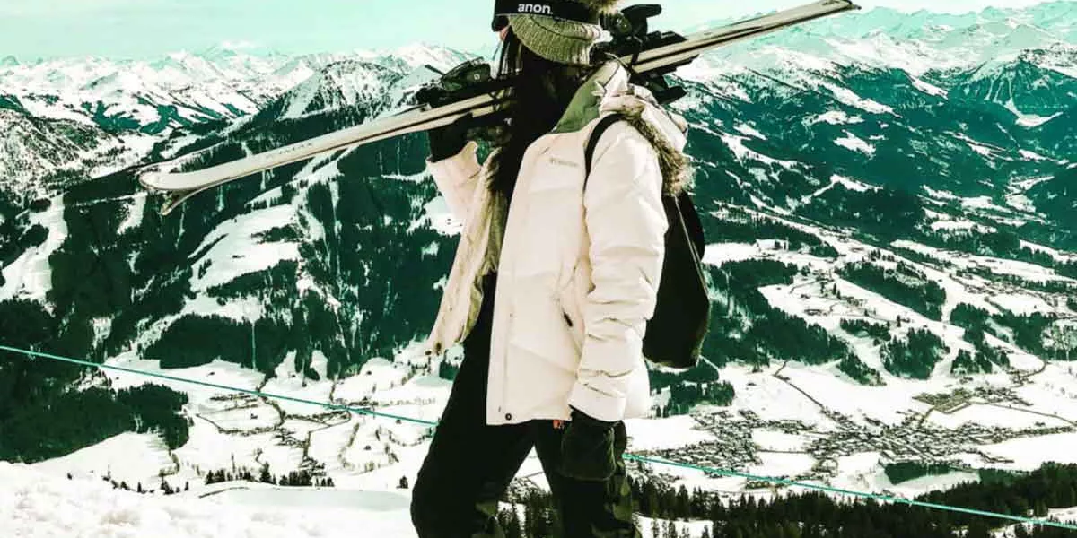 Young Female Skier In Snowy Mountains Austria