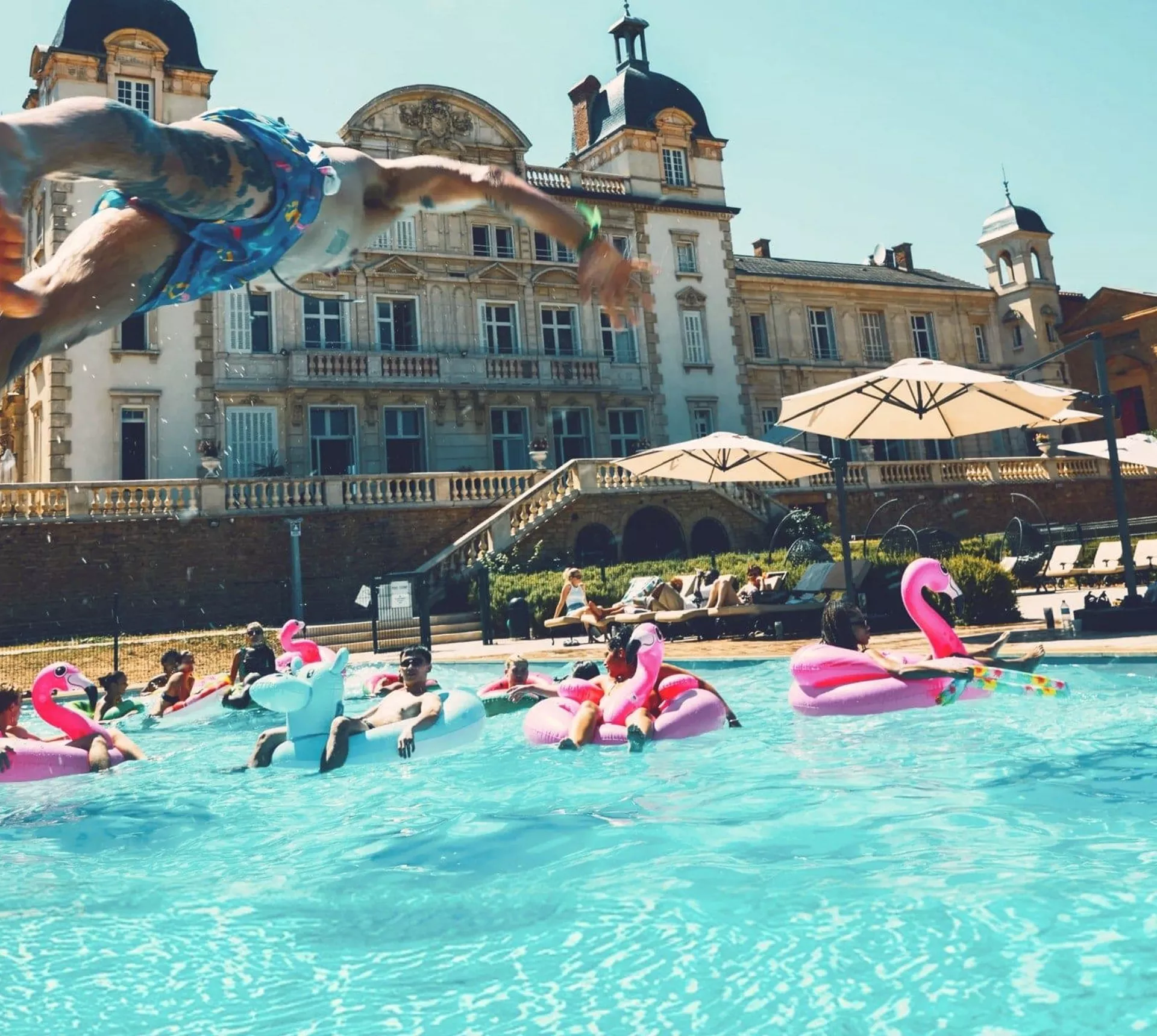 Travellers enjoying a pool party at Contiki's French château - Contiki European Adventurer Tour