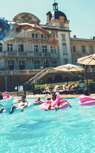 Travellers enjoying a pool party at Contiki's French château - Contiki European Adventurer Tour