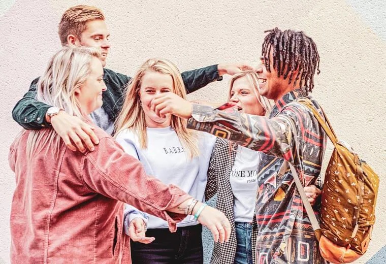 A Group of Young People Hugging Each Other