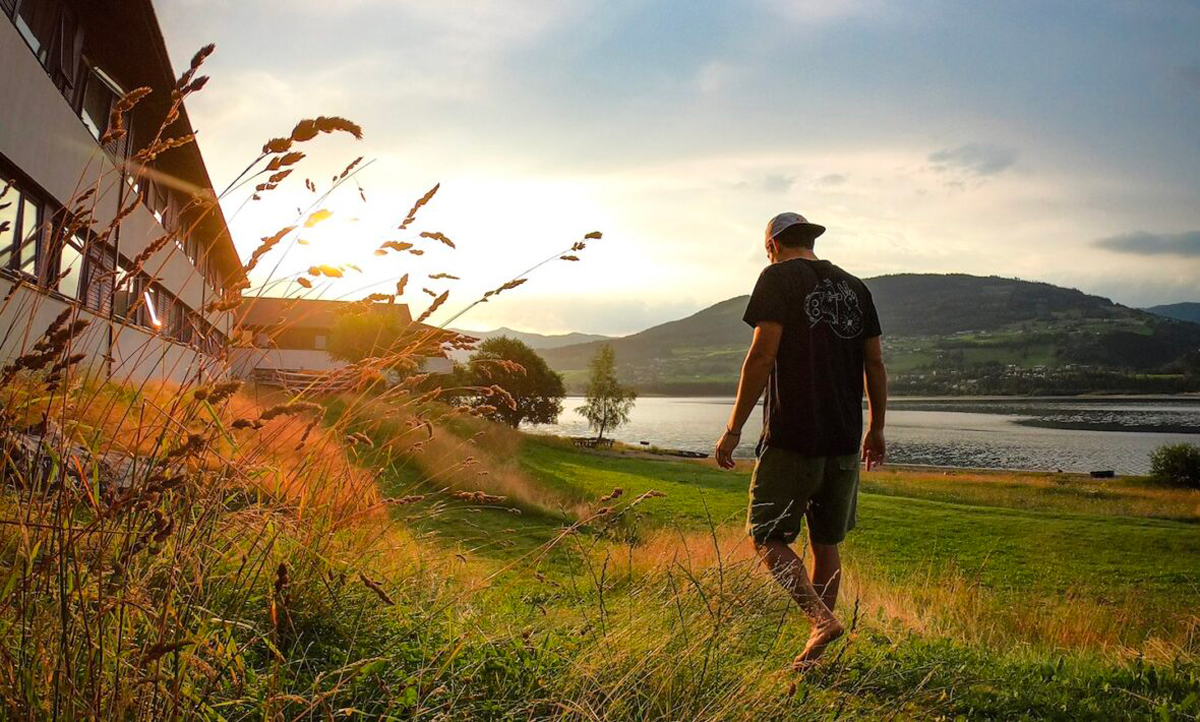 Man Walking Through Scandinavian Fields