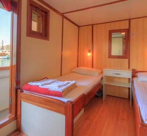 Interior of room with two single beds