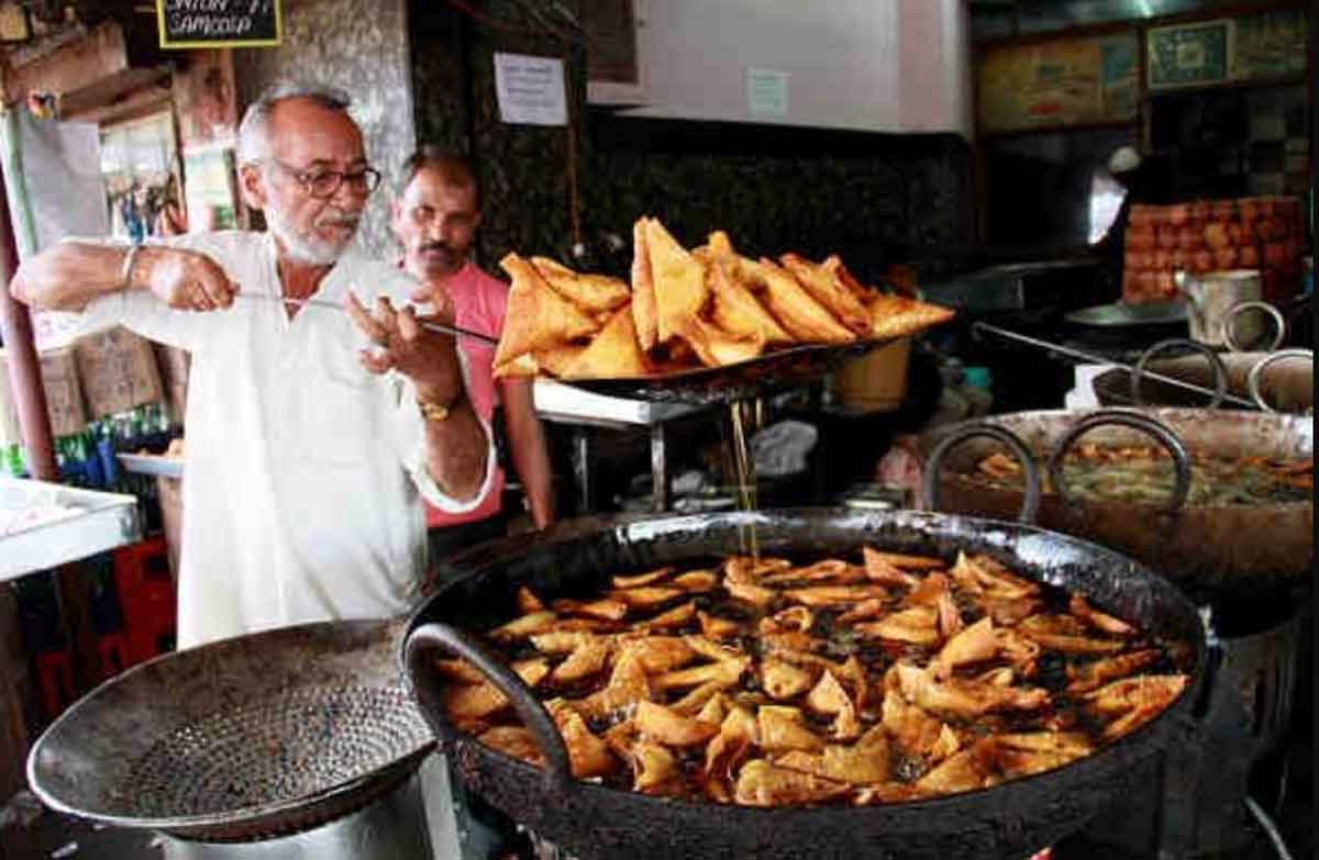 Man Cooking Samosas