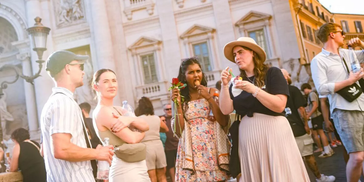 Group Standing Around In Italy
