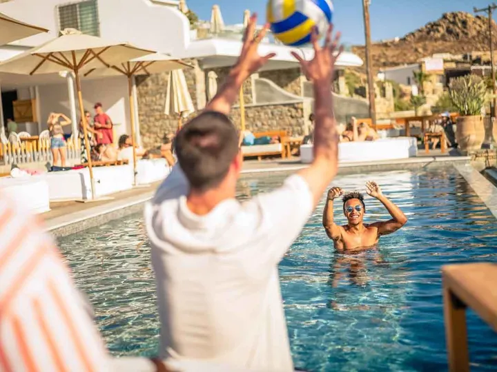 People In Pool Volleyball Greece