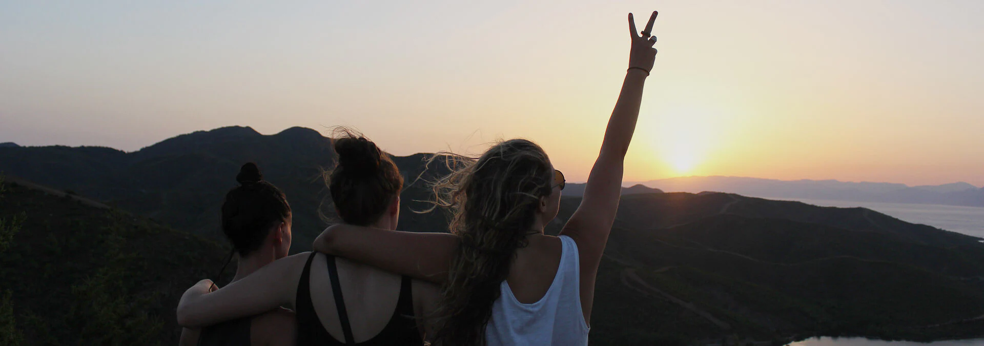 Tourists looking at sunrise over mountains close to Istanbul, Turkey