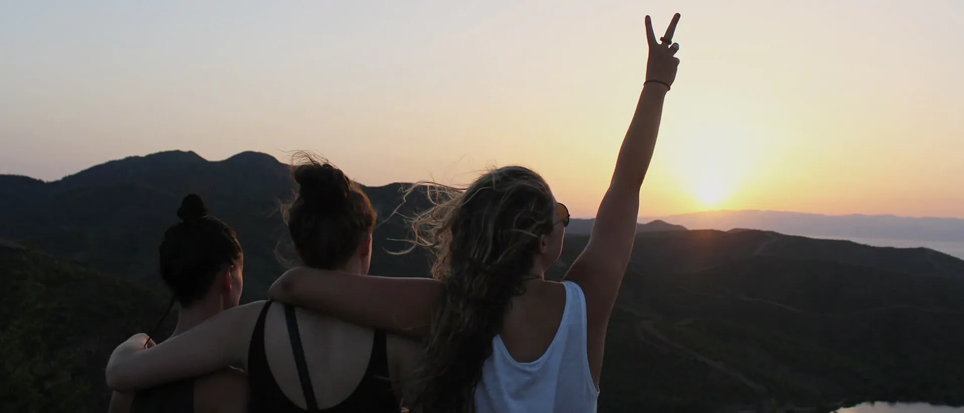 Tourists looking at sunrise over mountains close to Istanbul, Turkey