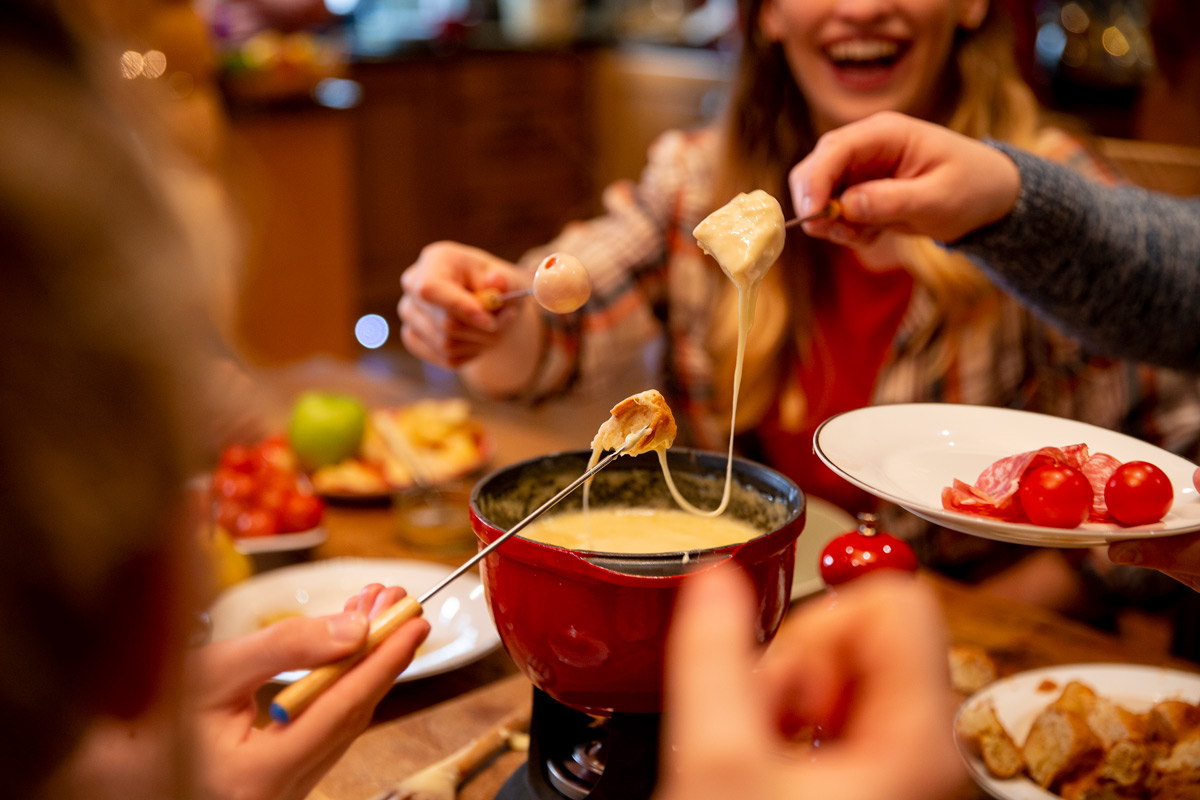 Friends Sharing A Fondue