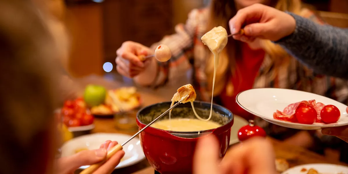 Friends Sharing A Fondue