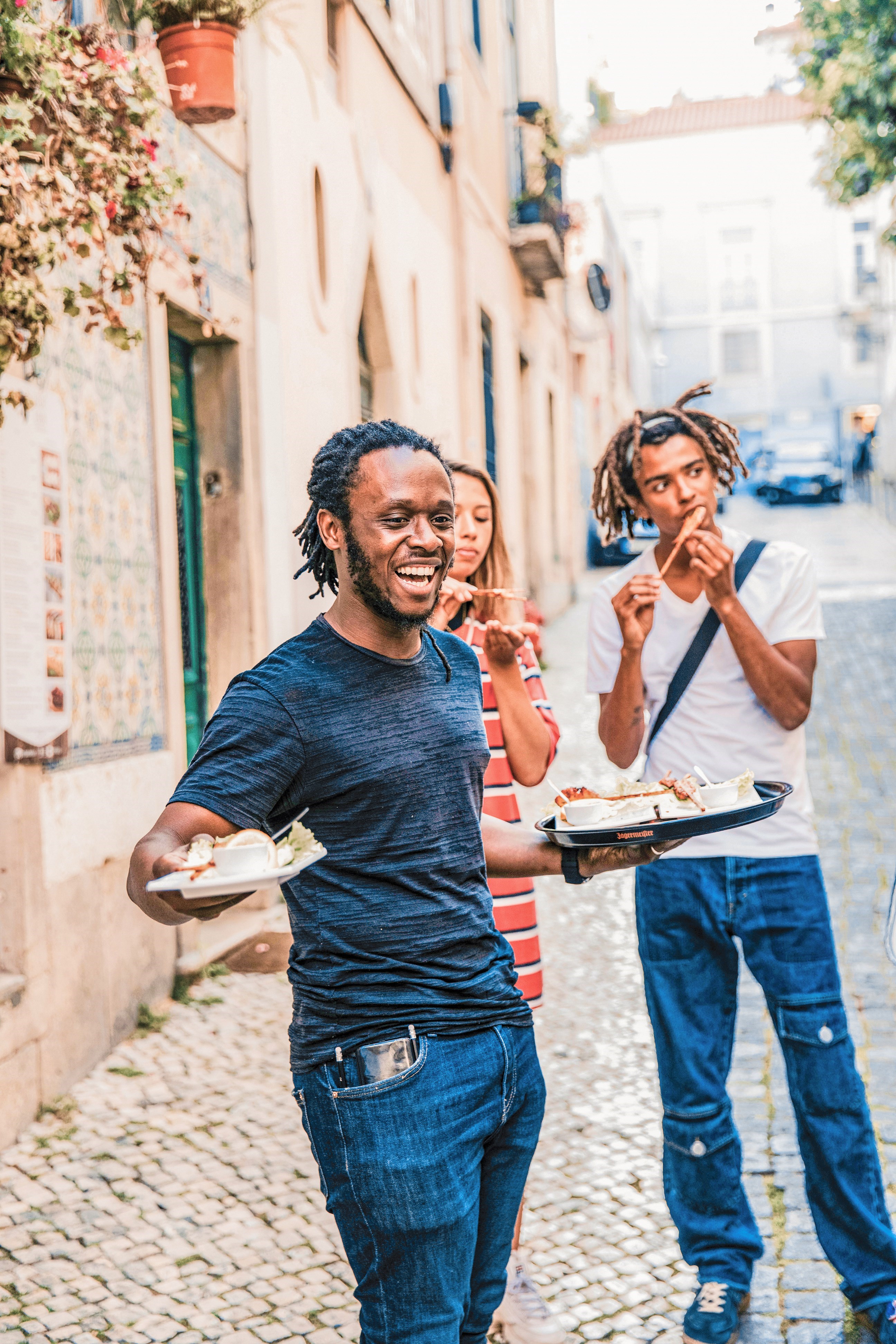 Travellers enjoying street food in Rome, Italy