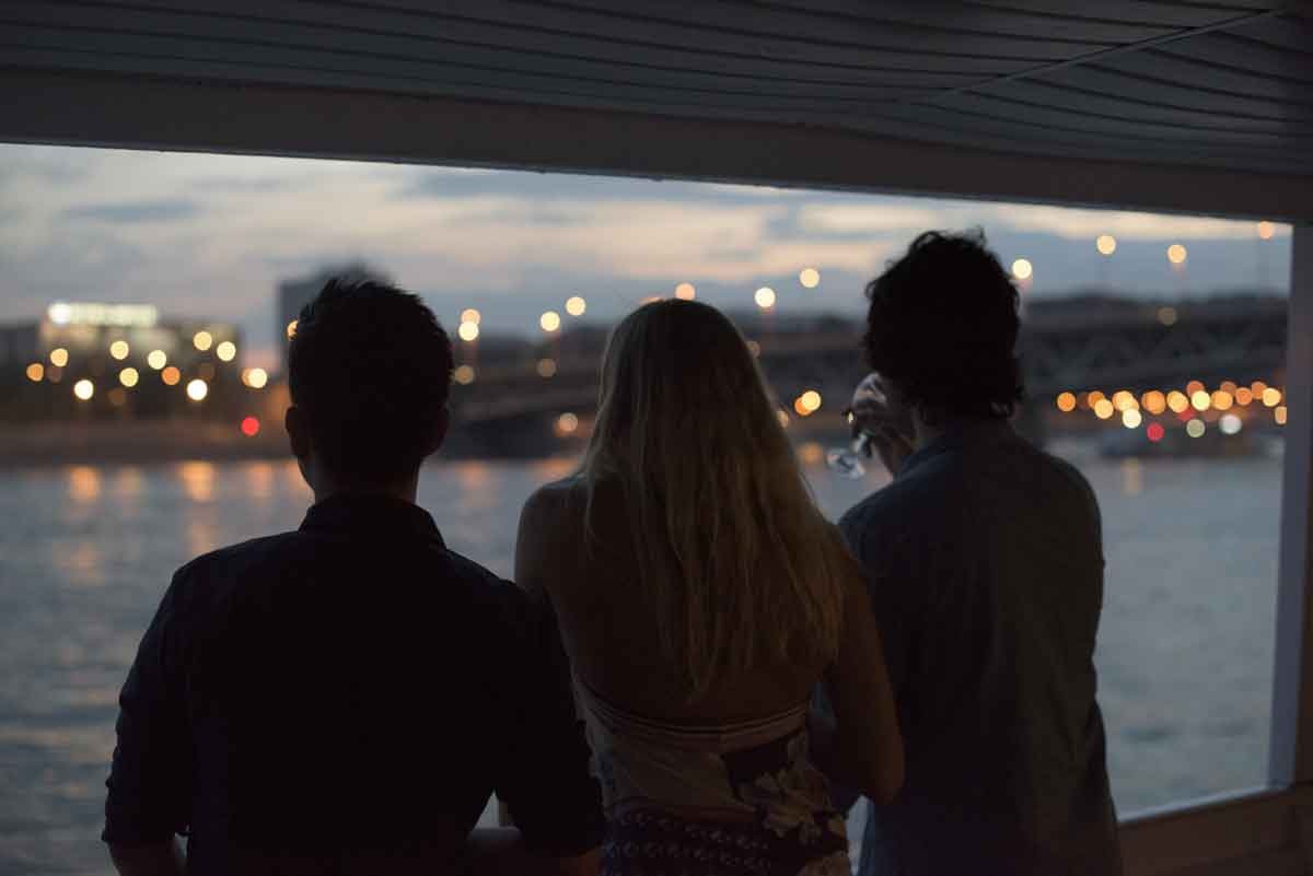 travellers-enjoying-an-evening-cruise-of-the-danube-budapest-hungary