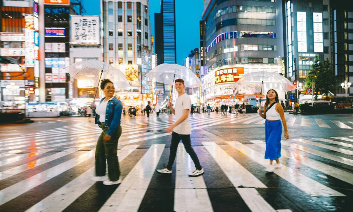 Three Friends Walking Through Tokyo