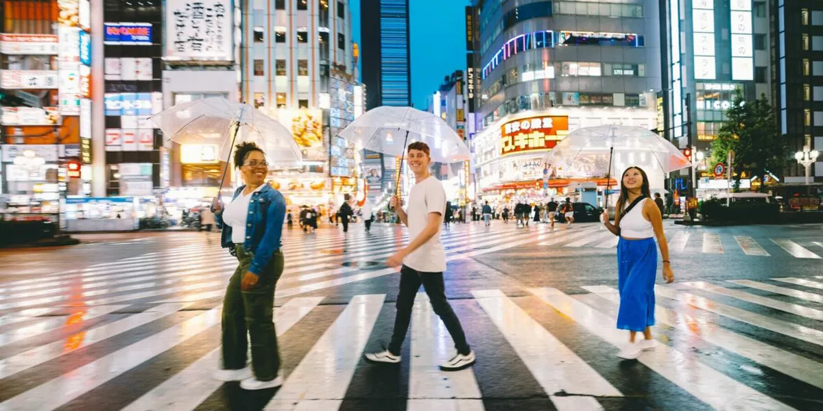 Three Friends Walking Through Tokyo