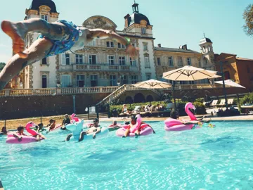 Travellers enjoying a pool party at Contiki's French château - Contiki European Adventurer Tour