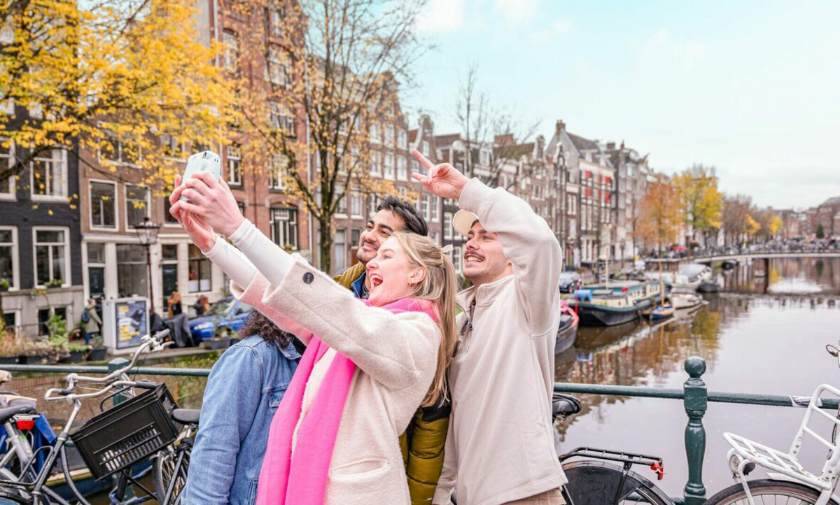 Friends Taking Photo In Amsterdam
