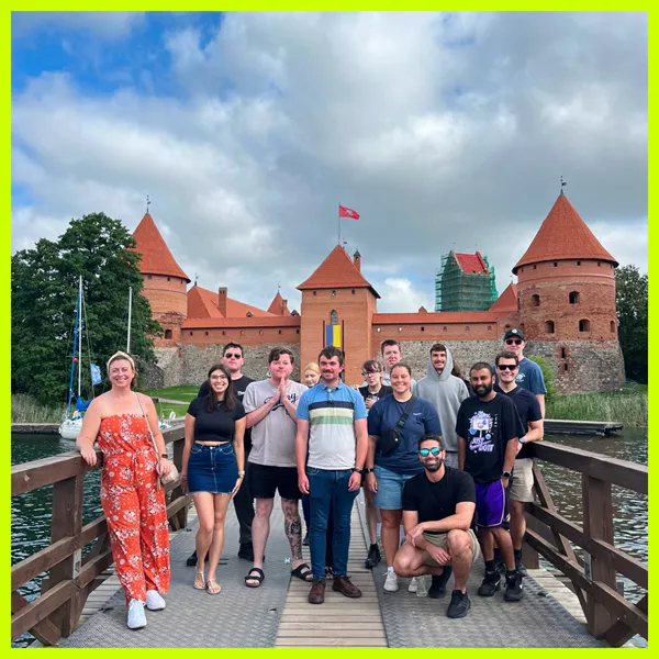 Travellers on the bridge leading to Trakai Island Castle, Lithuania