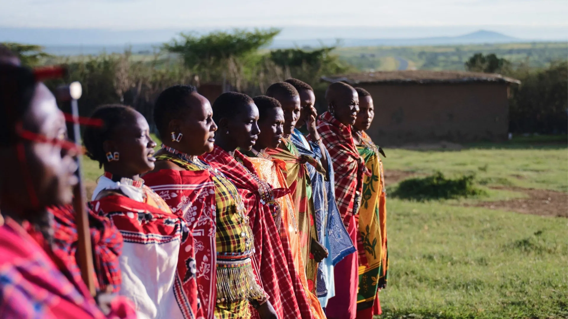 Maasai community members in traditional dress - Contiki's Uganda Gorillas & Maasai Mara Tour