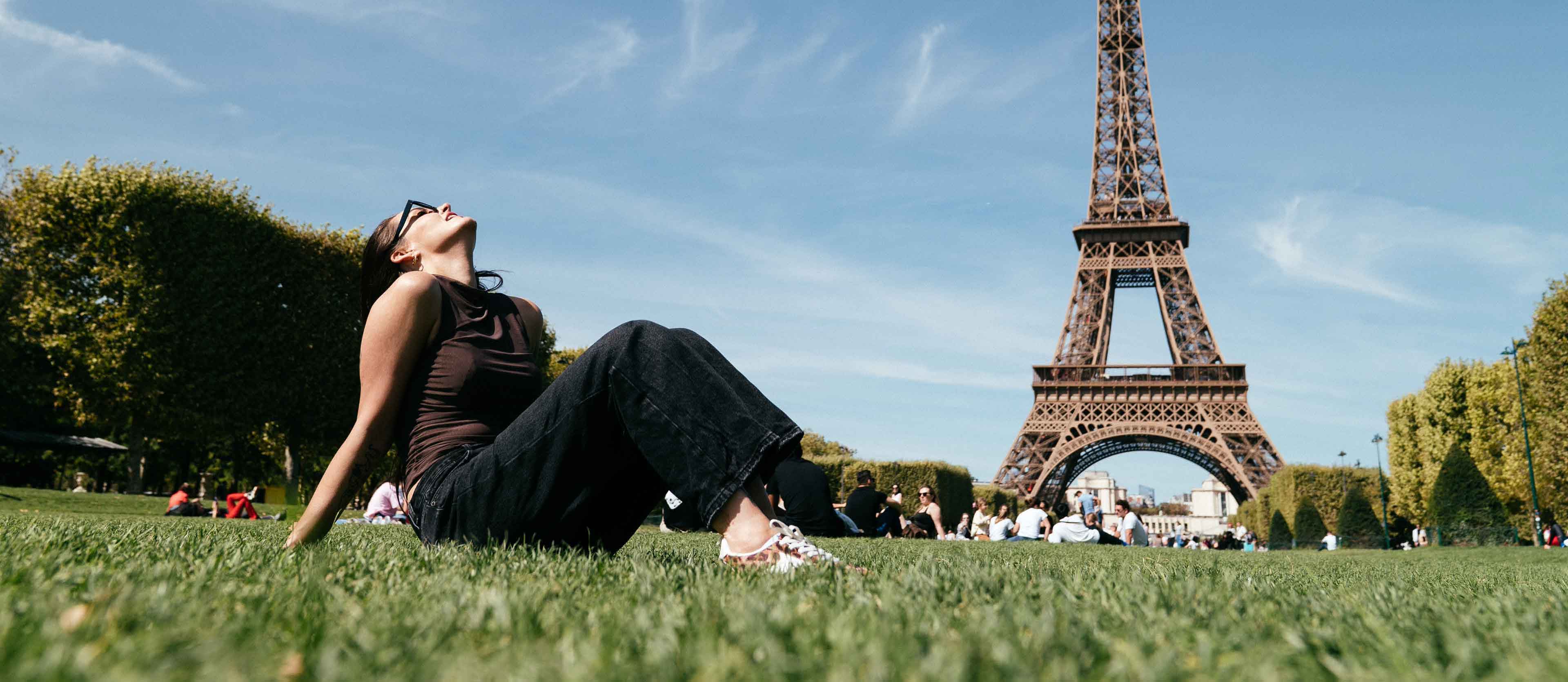 Relaxing In Front Of Eiffel Twoer Paris (1)