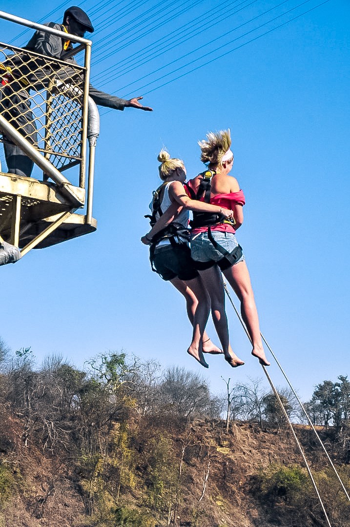 Travelers Riding Victoria Falls Bridge Swing