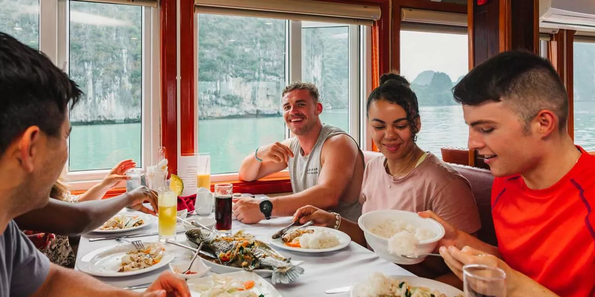 group-of-friends-having-lunch-on-the-boat.webp