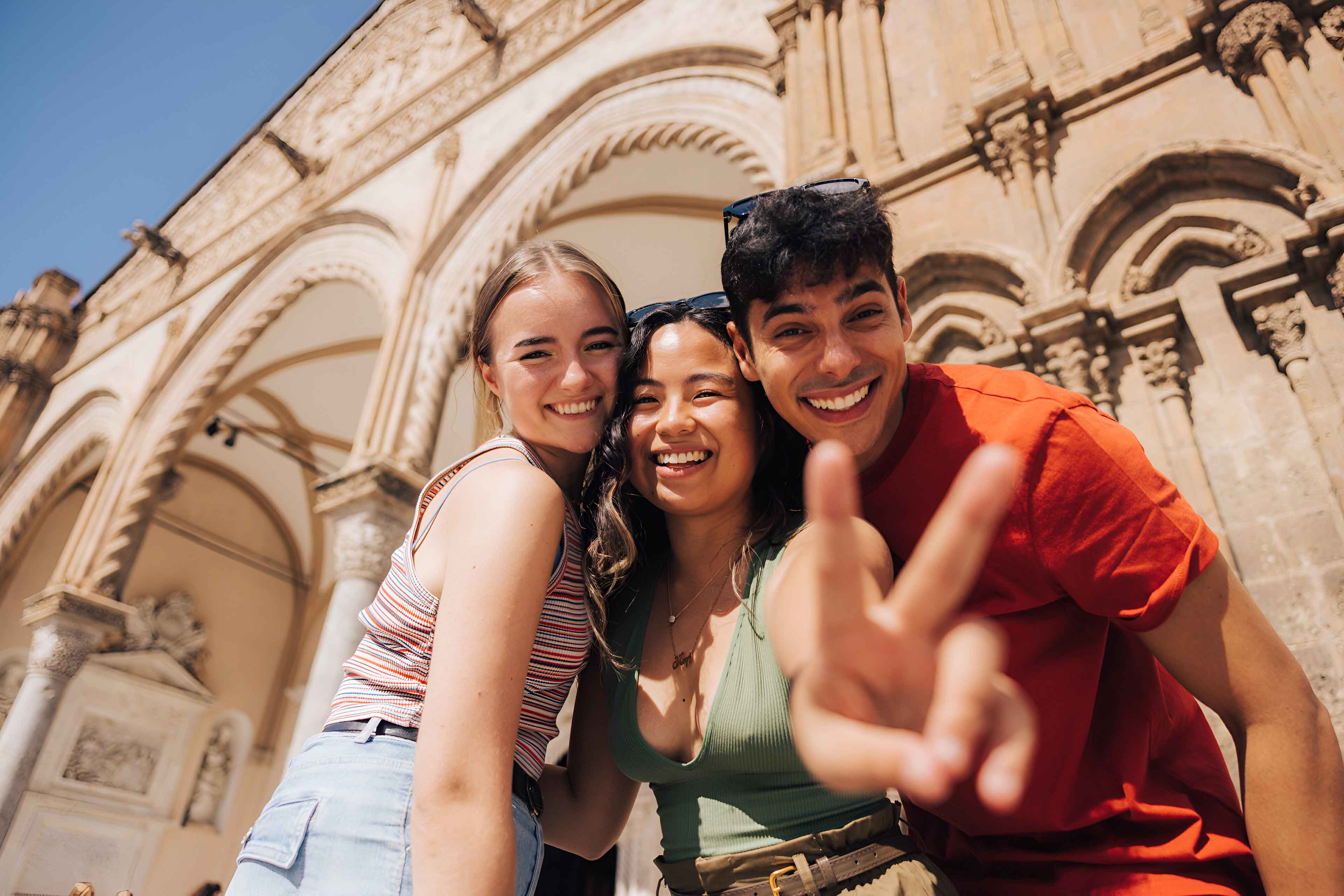 Group Exploring And Taking Photo In Sicily